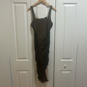 Black sheer body-con dress. Slit on side. Very flattering. LULUS.